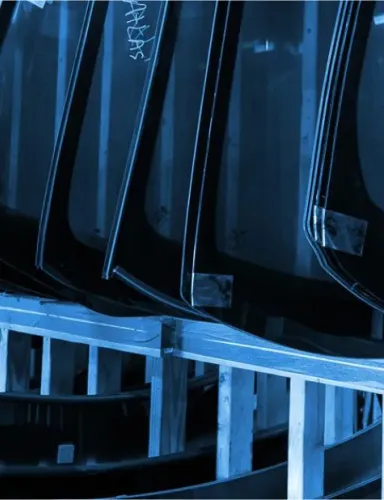 Racks of replacement windshields waiting to be fitted