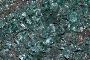 Shattered tempered car glass on the pavement